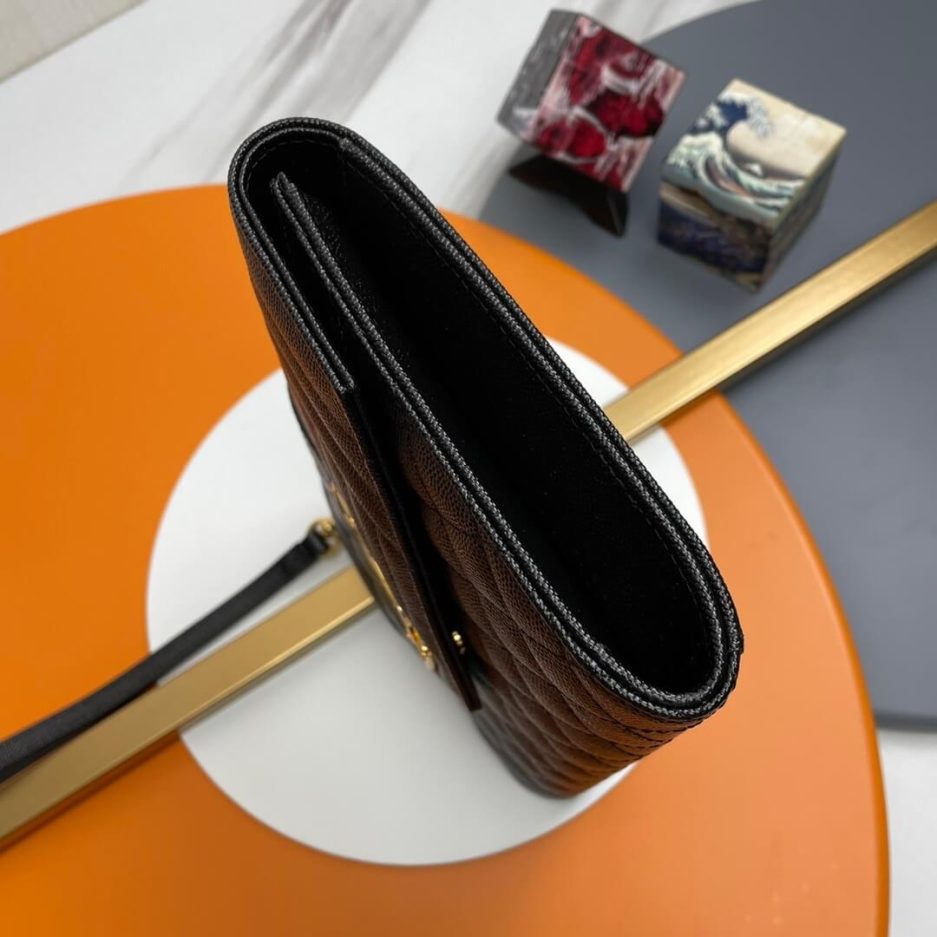 Y51 CASSANDRE matelassé leather flap clutch